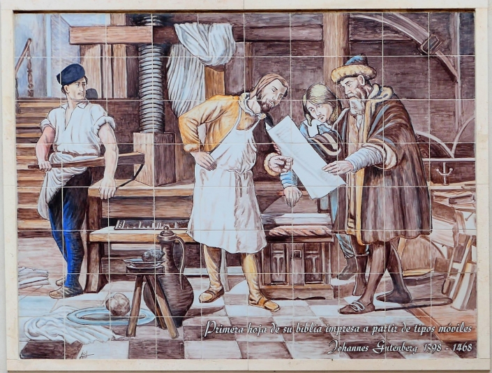 Mosaico de cerámica. Primera impresion de la biblia en el taller de Johannes Gutemberg. 1398 - 1468 Mecerreyes. Burgos. Particular.